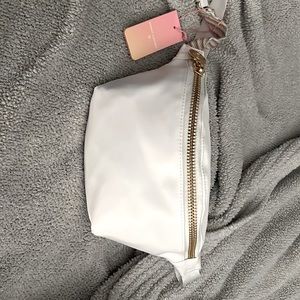 Stoney clover Fanny pack with tags and packaging inside